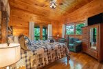 Master Suite Features a King Size Bed, Ensuite, and Private Screened In Deck